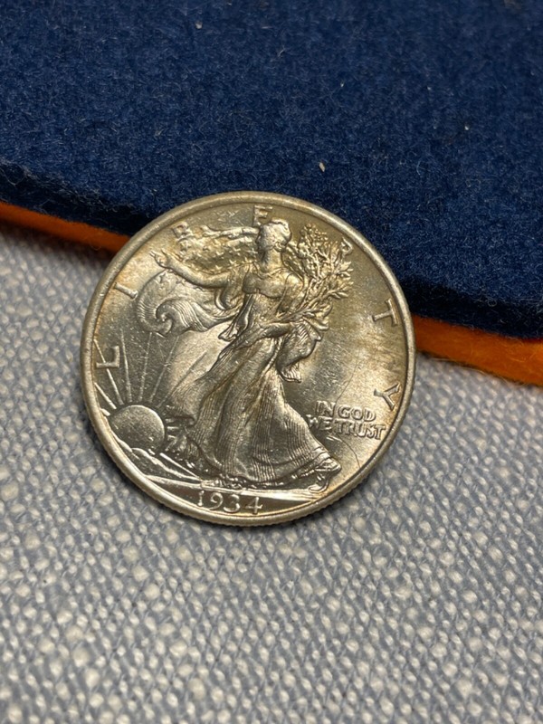 (#101395) Walking Liberty Half Dollar: 1934.  UNC/AU.  See video