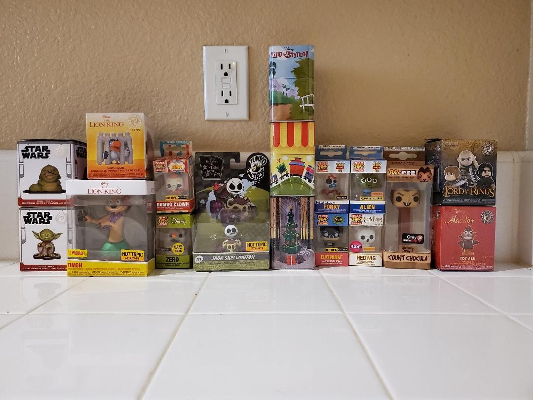 lot of funko key chains and figures, Disney, Pez dispenser