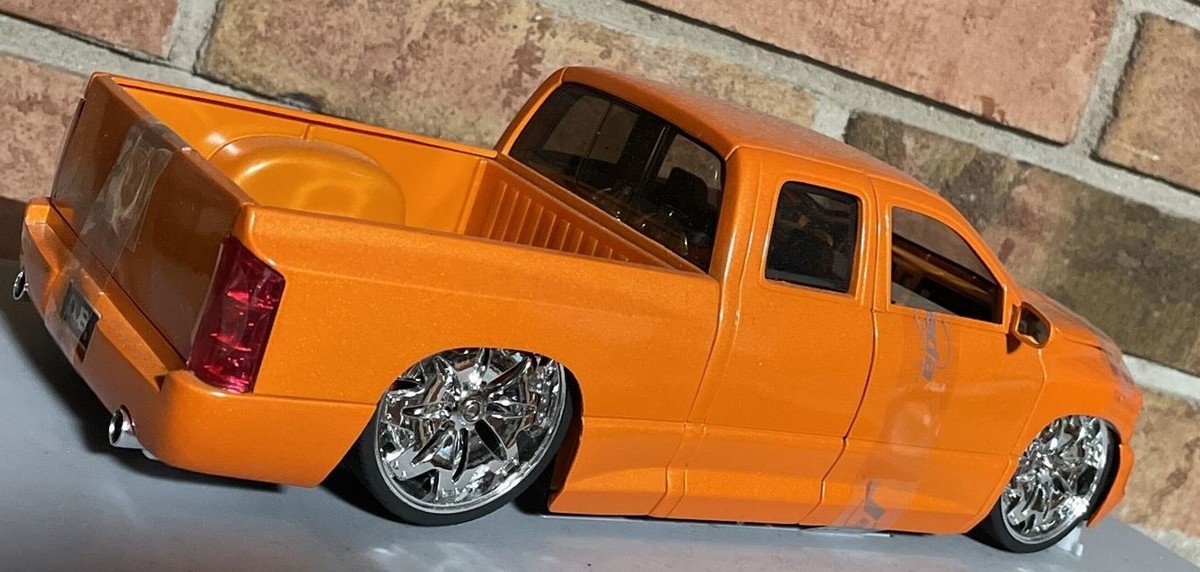 DODGE RAM ORANGE 1:18 SCALE DUB CITY WHEELS BY SPINTEK 24