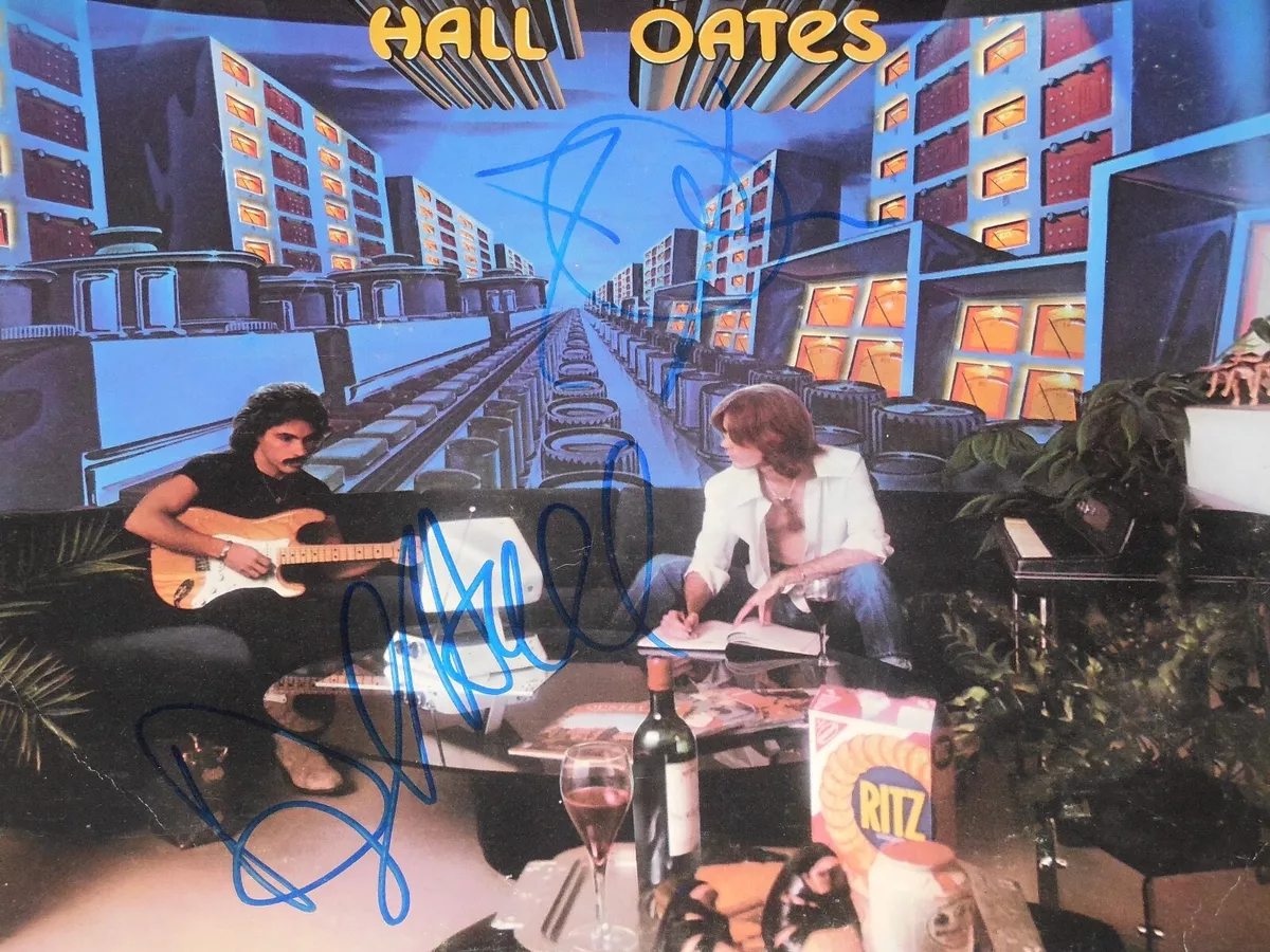 Lot - Hall And Oates Signed Photo/ Pick