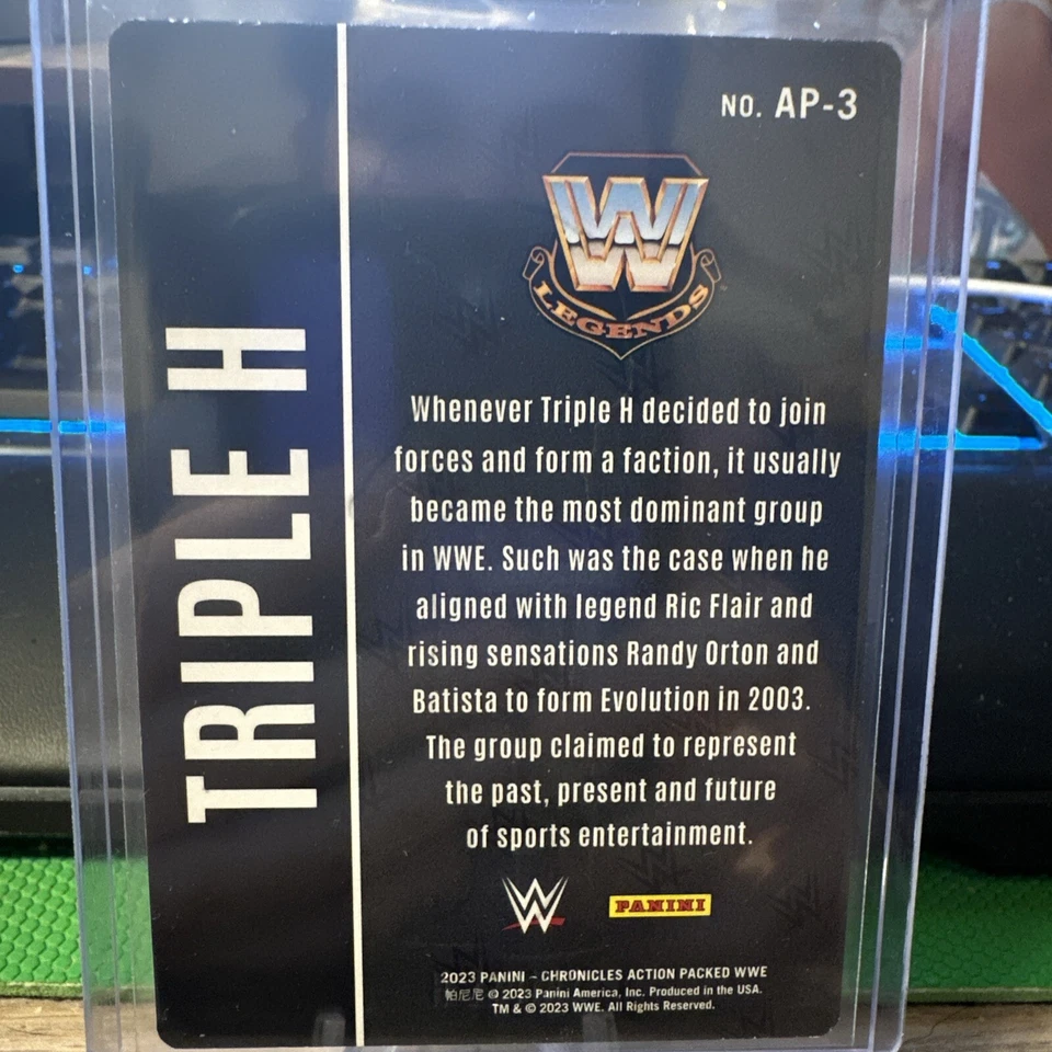 TRIPLE H -  2023 WWE Panini Chronicles Action Packed Insert 24k GOLD PARALLEL  - Image 2 of 2