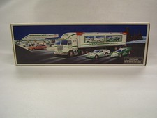 Hess 1997 Toy Truck and Racers in original box Head and Tail Lights