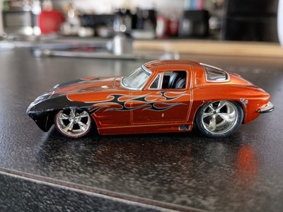 Jada Toys Cars. 1/64 1963 Chevy Corvette Stingray Orange Black