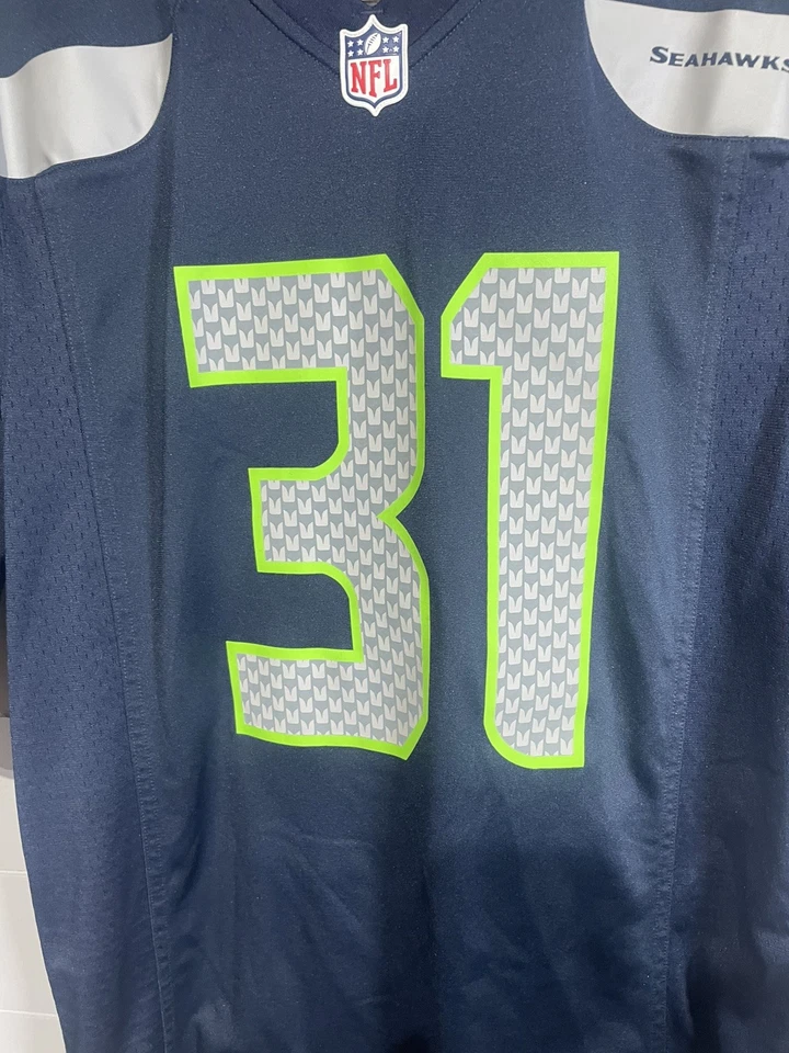 Camiseta deportiva juvenil de los Seattle Seahawks azul medio fútbol americano NFL Kam Chancellor 31 Nike Foto 3 de 4