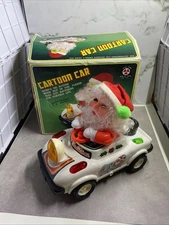 Video  Christmas 1980s Santa Car Electronic Audio & Lights Bump N Go Action Toy