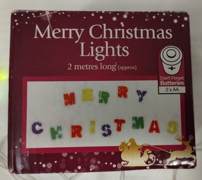 Batteriebetriebene Buchstabenbeleuchtung Frohe Weihnachten in Verpackung