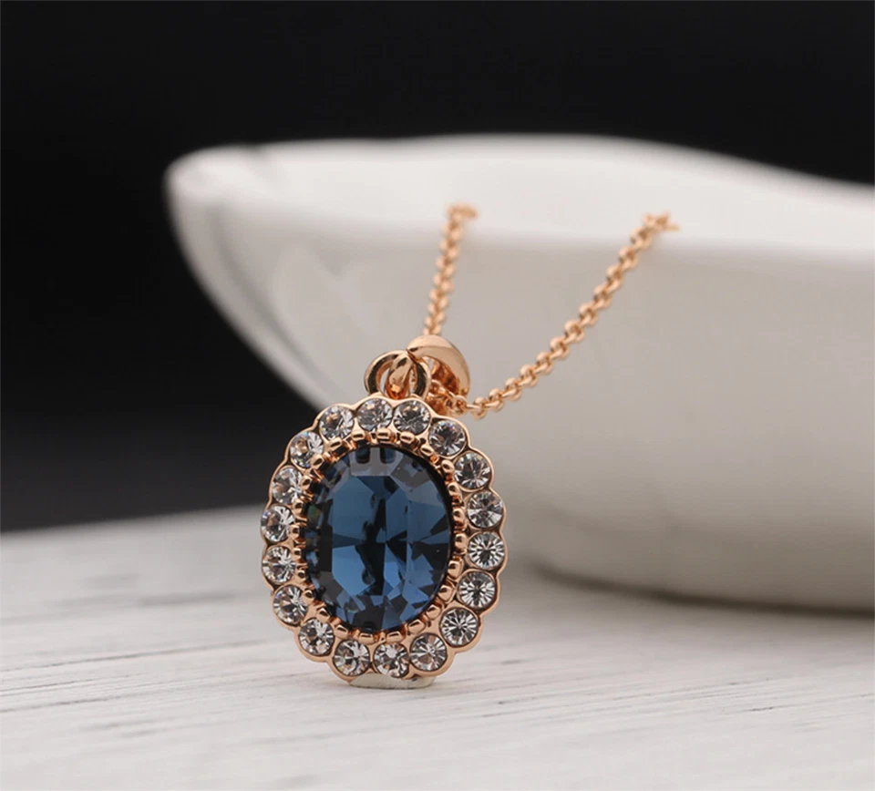 Collar colgante de cristal con elementos de Swarovski azul zafiro con forma ovalada para mujer Foto 4 de 4