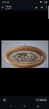 Quadro Ovale in legno dorato raffigurante dei Putti in ottime condizioni 