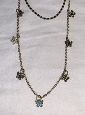 Gold Tone Double Strand Necklace With Tiny Butterflies On One Chain