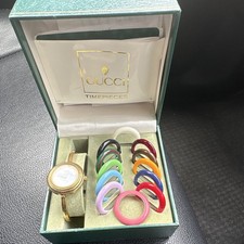 Gucci Change Bezel 1100L Women’s Gold Bangle Watch Multicolour Bezels