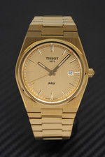 TISSOT PRX 40MM SWISS WATCH: STEEL & GOLD DIAL - RRP £425