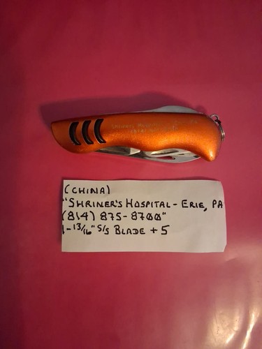 Shriner's Hospital Erie PA 13/16 5/5 Blade +5 Orange and Black in Color USED