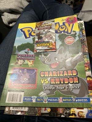 Pokémon Topic Media Special  Charizard Vs Rhydon  + Surging Sparks Fun Pack TCG