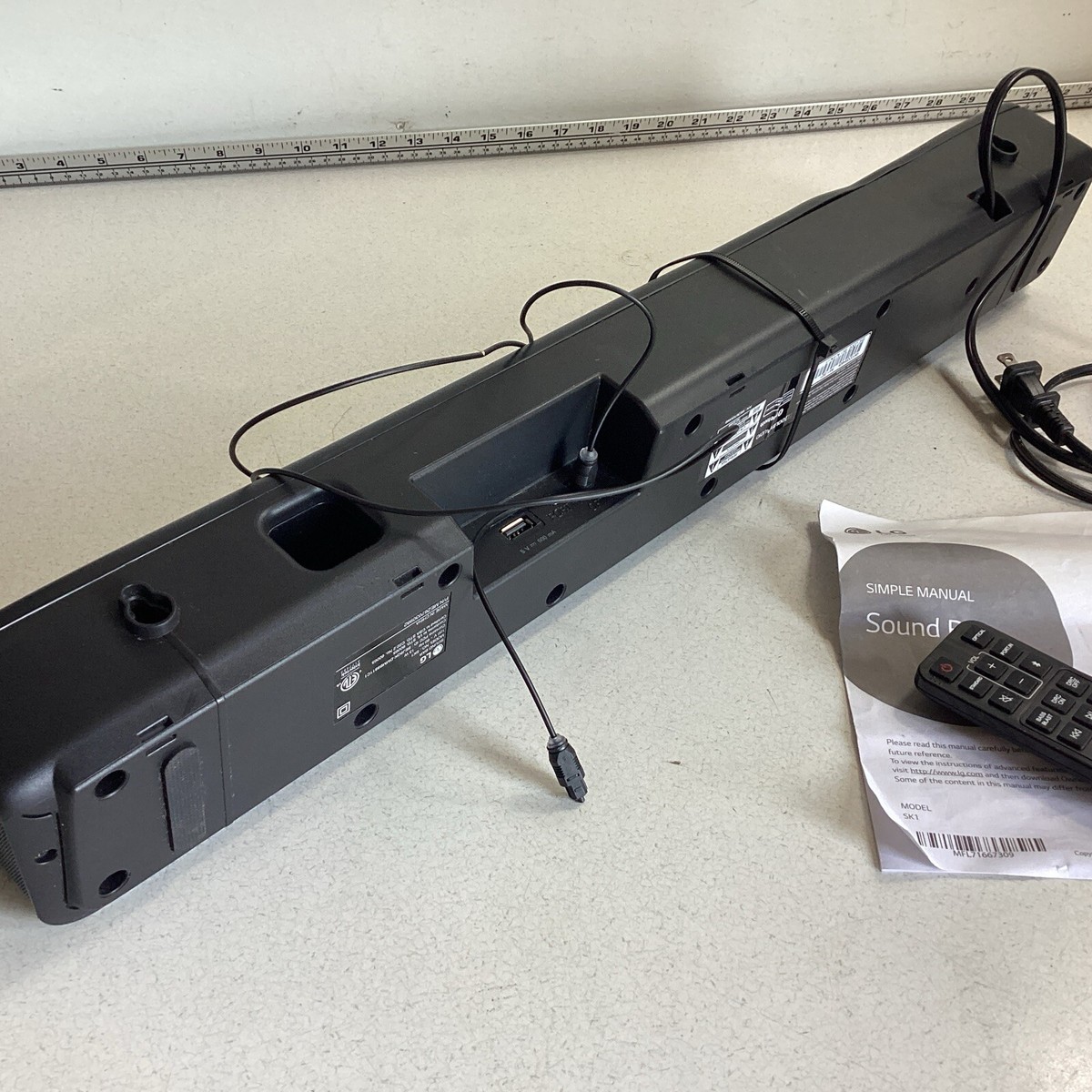 LG SK1 Sound Bar with Remote COV33552438 Optical Cord Stereo
