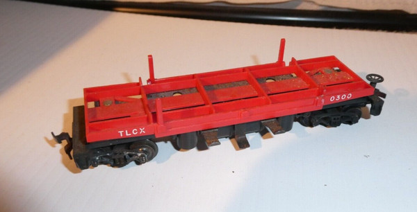 Coche de troncos de volteo lateral vintage años 50 escala HO Lionel TLCX 0300