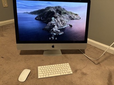 Apple 27  MacBook Desktop Computer with keyboard and mouse.