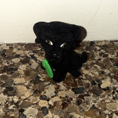 Velvet toy dog with a green collar toy no branding on it