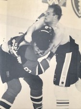 1994 Buffalo Sabres Rob Ray Pummels Devils Mike Peluso AP Press Paper Photo