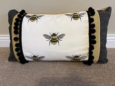 New handmade accent pillow. Embroidered honey bees, ball fringe. Approx 14x24.