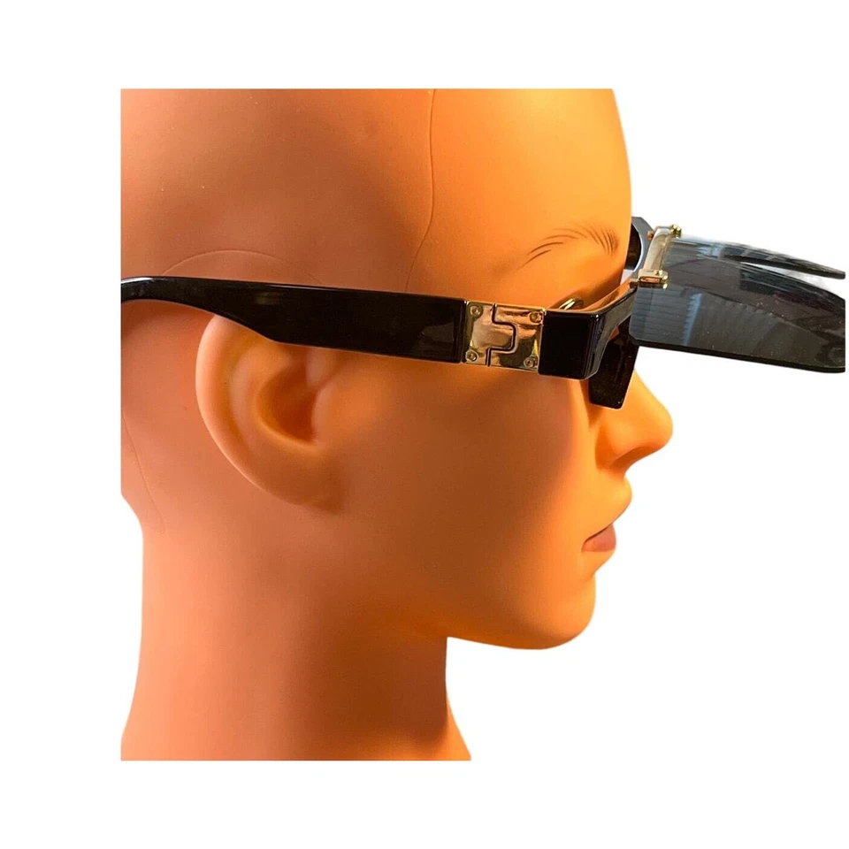 Gafas de sol Zero UV negras abatibles con detalles dorados Foto 3 de 4