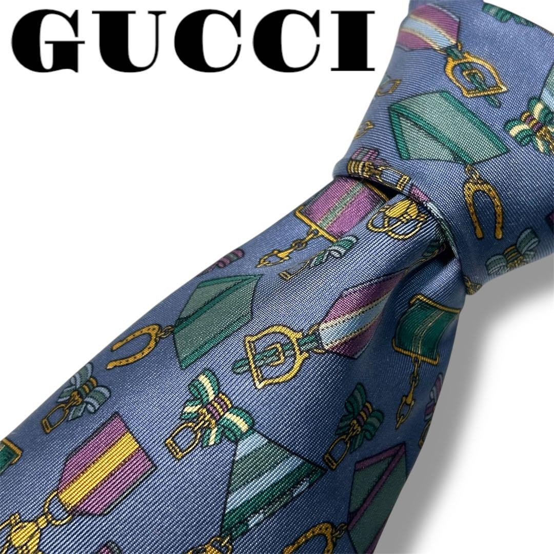 Gucci Navy Tie with Classic Medal Brooch Pattern