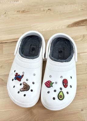 Crocs White clogs customized with Jibbitz charms. - Size M7W9