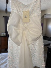 White Sequin Sleeveless V Neck Wedding Dress with Train and Large Bow