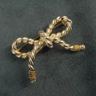 Vintage Tiffany & Co. Sterling Silver & 14k Yellow Gold Twisted Ribbon Brooch