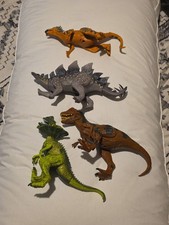 Lot Of 4 Dinosaurs Jurassic Pvc Figures Figurines Toys