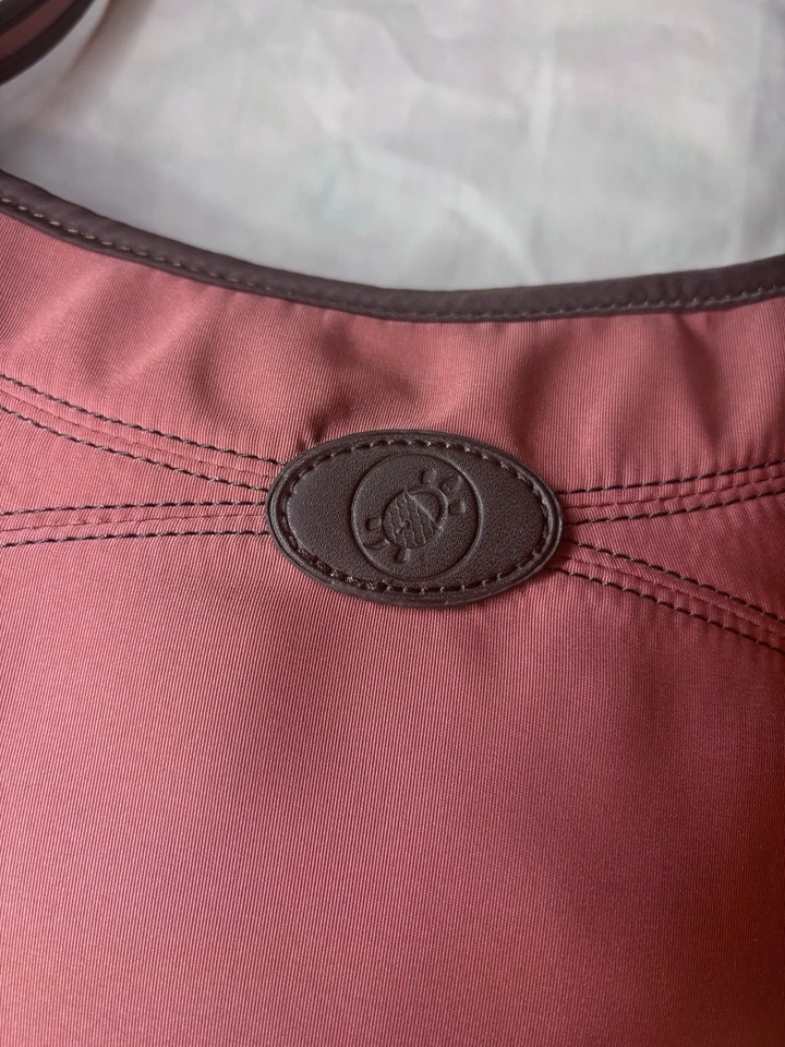 Bolso de hombro Pacsafe Citysafe antirrobo para mujer - naranja quemado Foto 2 de 4