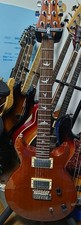 Guitarra Eléctrica PRS SE Santana Naranja Tapa de Arce Pastilla Dimarzio DP100
