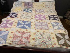 VTG FABRIC HANDSTITCHED QUILT 74  X 67  