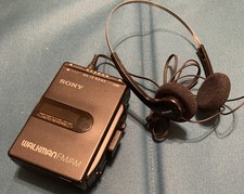 Sony Walkman WM-F2061 AM/FM Cassette Player Sony MDR-006 Headphones New Belt