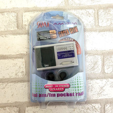 New NIB AM/FM Pocket Radio Portable Battery Operated Speaker  3.5mm Headjack