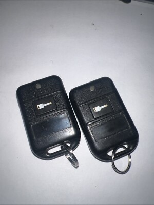 2 CLEAN FORD KEYLESS CODE ALARM REMOTE START KEY FOB 1 BUTTON GOH-PCMINI RED LED