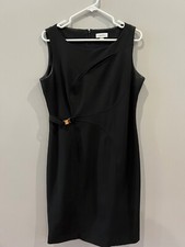 Calvin Klein black dress, sleeveless, belted, decorative cut out across chest