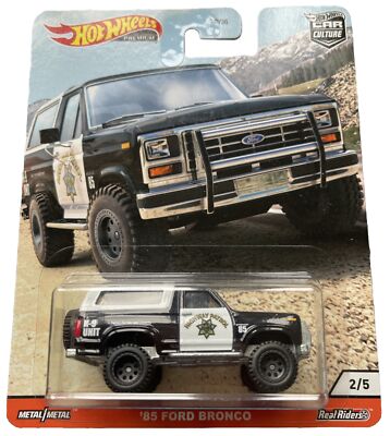 Hot Wheels '85 Ford Bronco Highway Patrol Wild Terrain 4x4PREMIUM RealRiders NEU