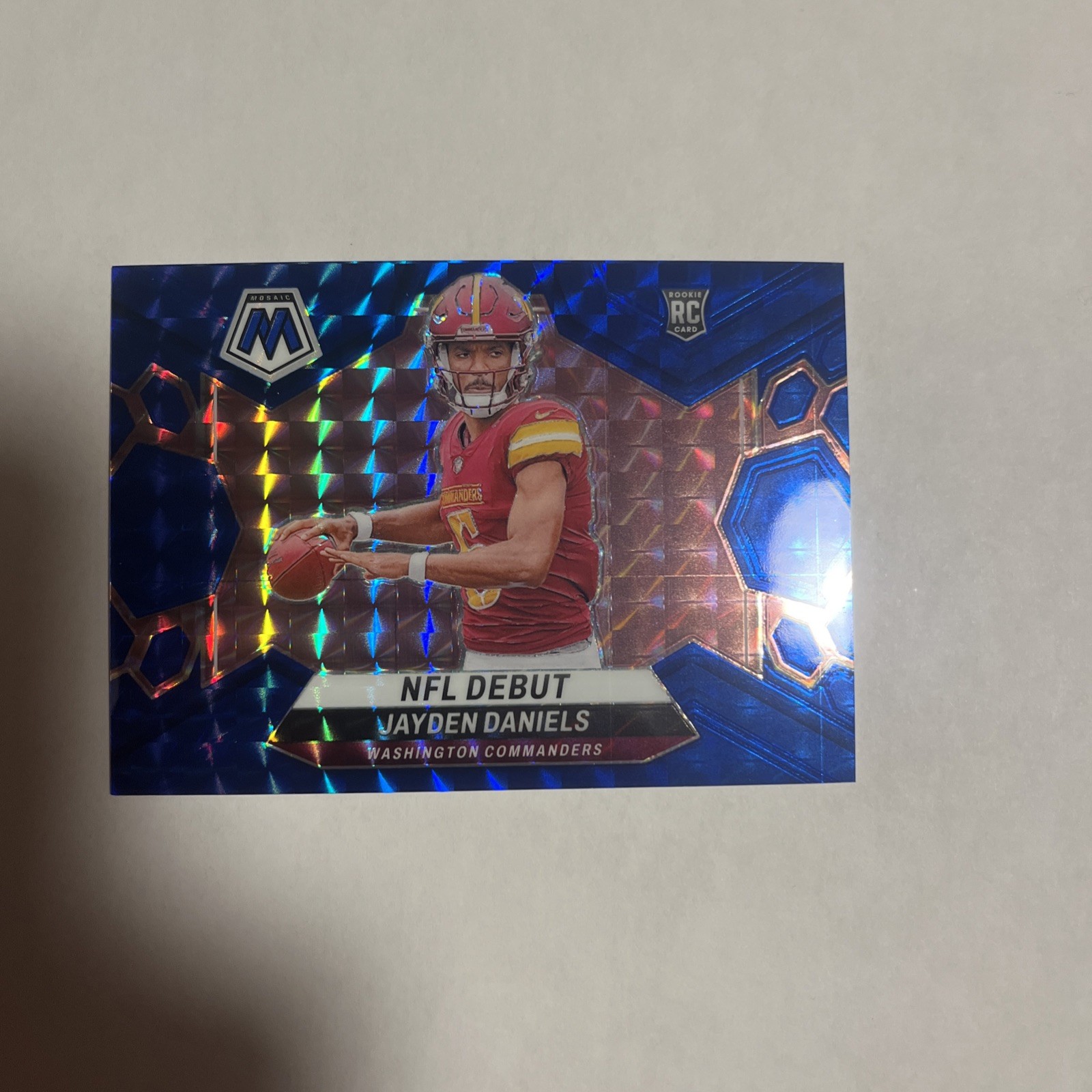 2024 Panini Mosaic NFL Debut Jayden Daniels #272 Blue Mosaic Prizm /99 (RC)