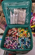 200 COPIC MARKERS W/CASE included is 3 refills for blending and pkg of nibs.