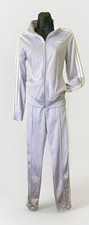 Adicolor Firebird Track Suit  modern cut, lavender hue, iconic adidas heritage.