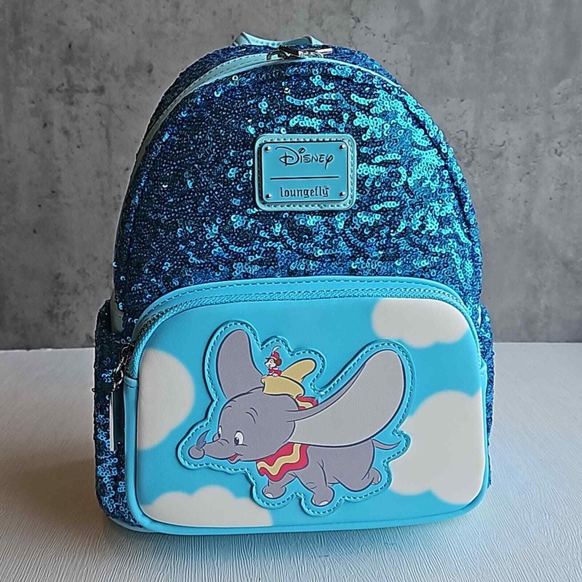 Disney x Loungefly Teal Dumbo Sequin Mini Backpack NWT | eBay display picture 1