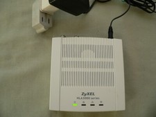 ZYXEL HLA-3105 ETHERNET BRIDGE HPME PNA 3.1 COAXIAL WITH POWER PLUG