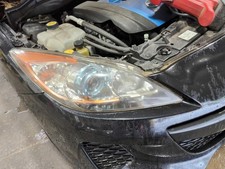 Used Right Headlight Assembly fits: 2012 Mazda 3 halogen blue projector bezel wi