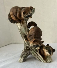 Masterpiec by Homco 3 Raccoons on Tree Limb Porcelain Figurine 8.5” x 5”