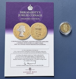 1962 English Shilling Layered With 24ct Gold Accented Rhodium Platinum. COA.