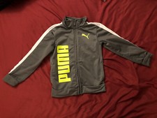kids puma jacket size 6 grey with green word With Scratch On It