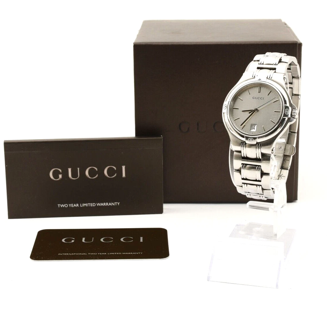 Montre GUCCI 9040M analogique quartz date 36 mm 3 ATM argent fabrication suisse avec boîte