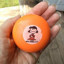 Vintage 1970s Lucy Peanuts Collectible Yo Yo orange United feature Syndicate