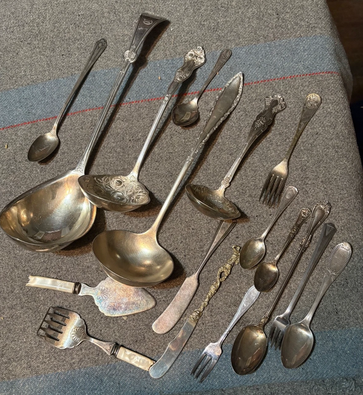 Three vintage silverplate soup or punch ladels plus other interesting pieces