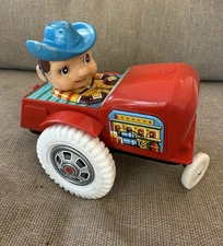 Vintage 1970s ''FARM BOY ON TRACTOR''  Wind-Up Toy w/Key by Modern Toys Japan